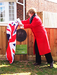 QEII Field unveiling the plaque