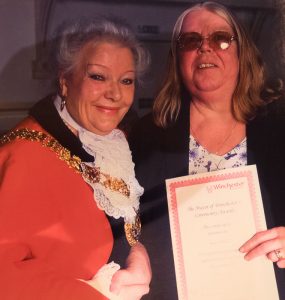 Sue Down with the Mayor